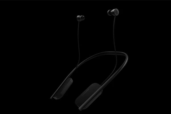 Black wireless translator earbuds with neckband for real-time language translation