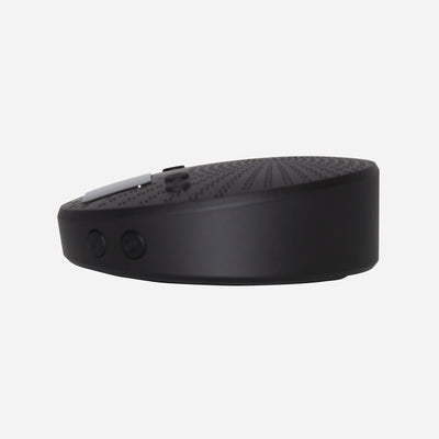 A black portable conference speaker with a built-in microphone and echo cancellation algorithm